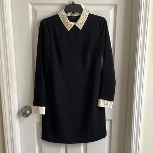 Black dress with pearl neck